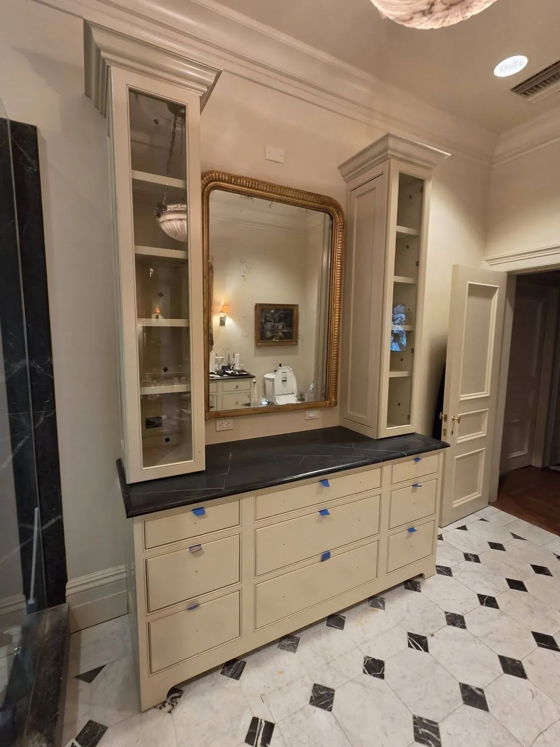 Finished, painted built-in installed with mirror and countertop